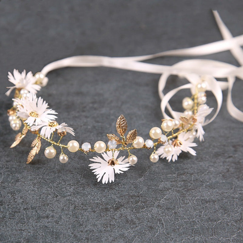 Diadema para el cabello con diseño de flores y perlas