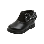 Zapato elegante para niñas con diseño moderno y lazo lateral con lunares en España