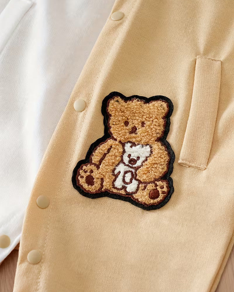 Mono bebé invierno una pieza con botones frontales estilo Varsity  ropa bebé niño destacada para looks elegantes y en España