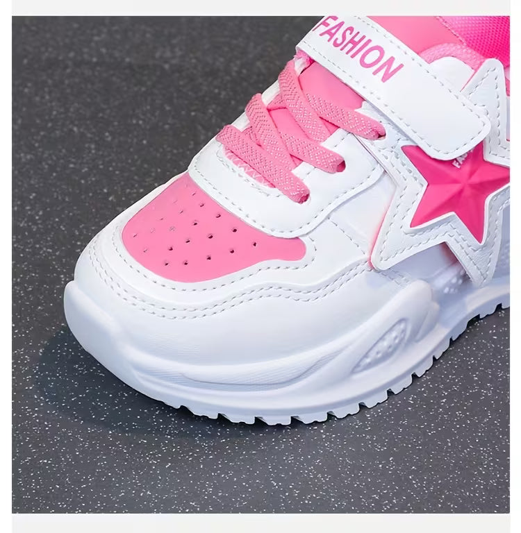Pink and white kids' sneaker with star design and velcro strap for comfort and style