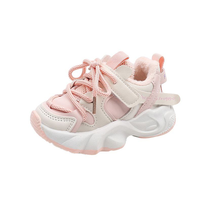 Zapatilla deportiva ligera y transpirable con cordones y diseño moderno para niños vista lateral