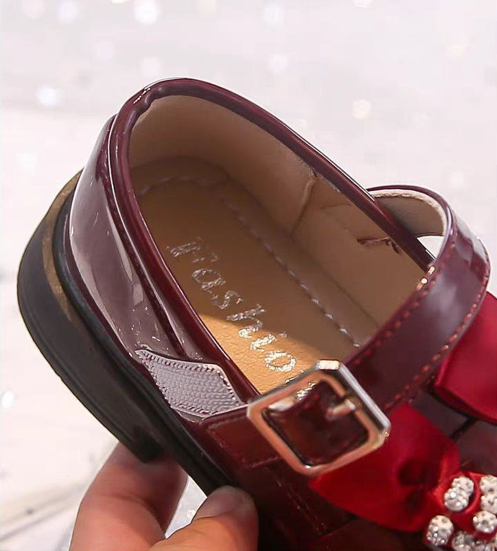 Zapato elegante para niñas con lazo adornado y colores brillantes detalle lazo