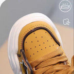 Zapatillas deportivas para niños con diseño moderno