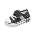 Zapato infantil con diseño de oso caricaturesco