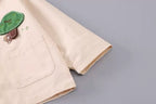Conjunto niño 3 piezas: camisa de botones, camiseta interior y pantalón verde de algodón en España
