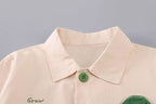 Conjunto niño 3 piezas: camisa de botones, camiseta interior y pantalón verde de algodón en España