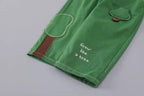 Conjunto niño 3 piezas: camisa de botones, camiseta interior y pantalón verde de algodón en España