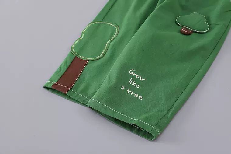 Conjunto niño 3 piezas: camisa de botones, camiseta interior y pantalón verde de algodón en España