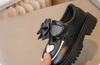 Zapato clásico elegante para niña con diseño de lazo frontal en España