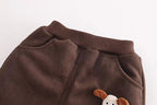 Brown corduroy kids pants with cute animal appliqué, soft and cozy for children's wear