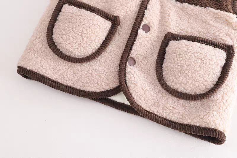 Soft beige and brown fleece baby vest with cozy pockets and snap buttons for easy wear