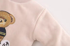 Soft pink kids sweater with embroidered teddy bear, cozy children's clothing for comfort and style