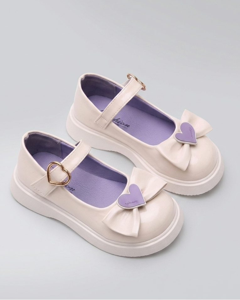 Zapato elegante para niña con lazo frontal de diseño moderno en España