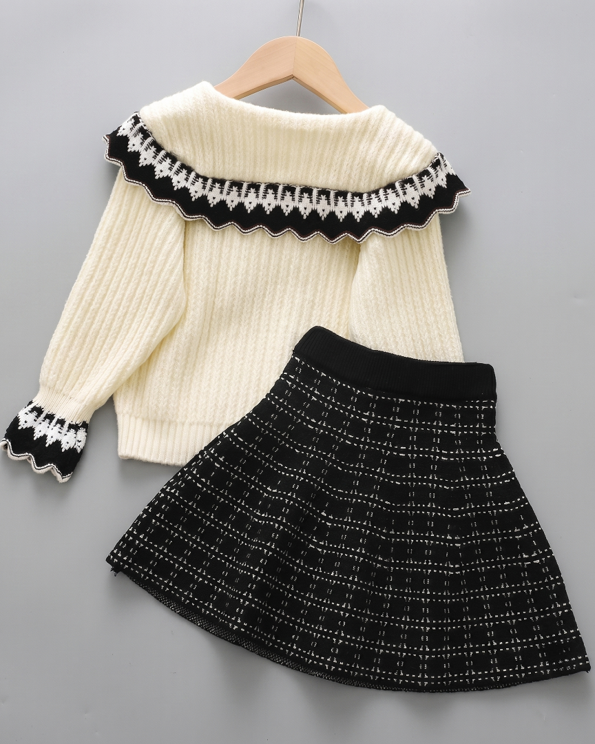 Conjunto niña invierno 2 piezas cárdigan de punto y falda estampada ,destacada para looks elegantes y sencillos en España