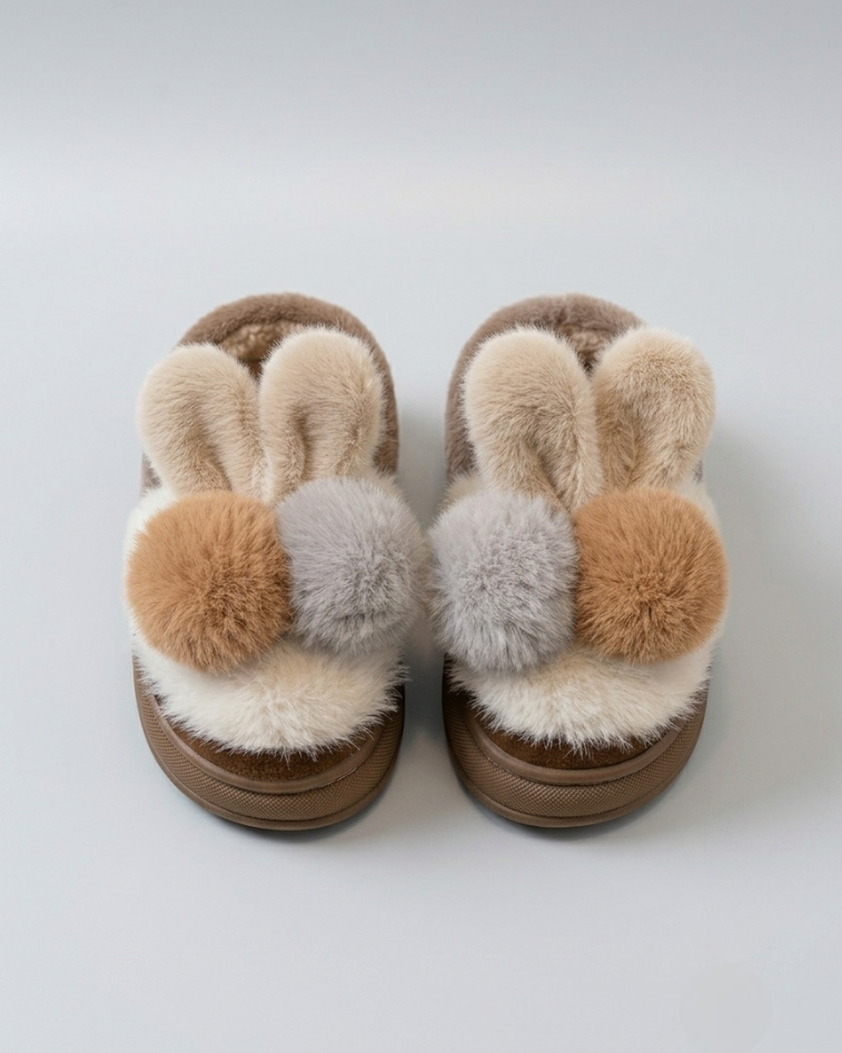Pantuflas de invierno cálidas para niños con peluche suave y bolas de colores en España