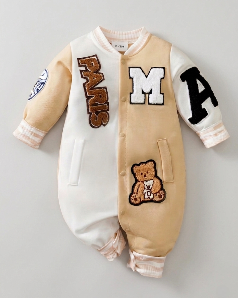 Mono bebé invierno una pieza con botones frontales estilo Varsity  ropa bebé niño destacada para looks elegantes y en España
