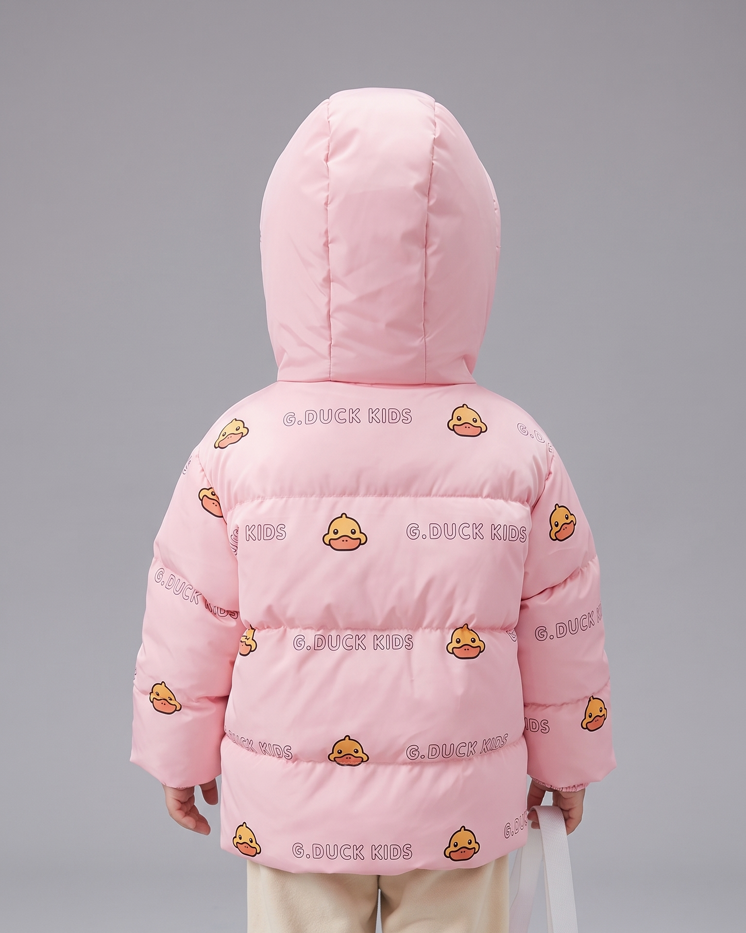 Chaqueta infantil de invierno con capucha y estampado de patitos acolchada con bolsita a juego en España