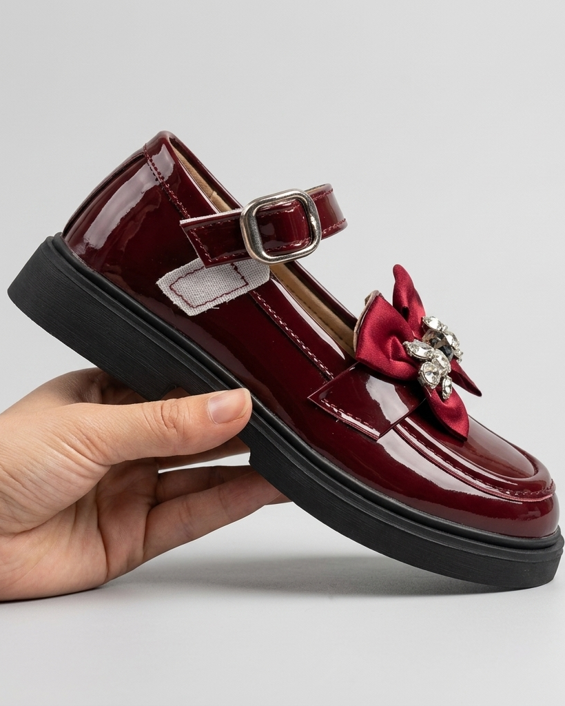 Zapato elegante para niñas con lazo adornado y colores brillantes en España