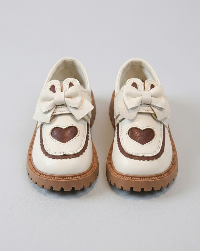 Zapato clásico elegante para niña con diseño de lazo frontal en España
