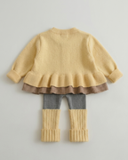 Conjunto niña invierno 2 piezas cárdigan de punto y falda estampada ,destacada para looks elegantes y sencillos en España