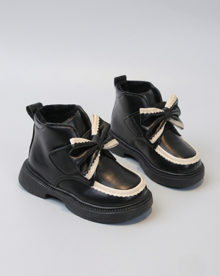Zapato de invierno elegante con un lazo lujoso en España