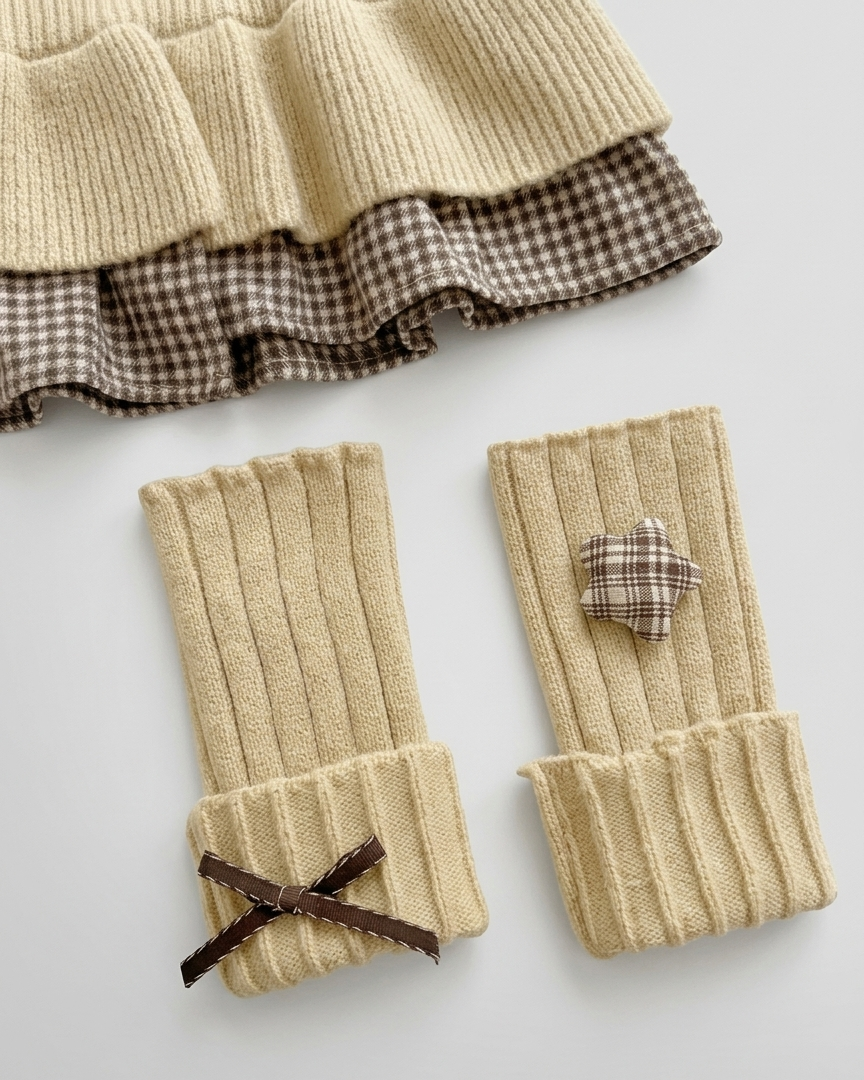 Conjunto niña invierno 2 piezas cárdigan de punto y falda estampada ,destacada para looks elegantes y sencillos en España