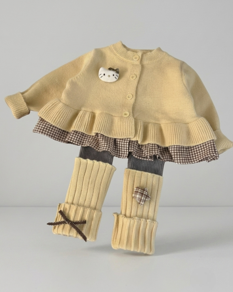 Conjunto niña invierno 2 piezas cárdigan de punto y falda estampada ,destacada para looks elegantes y sencillos en España