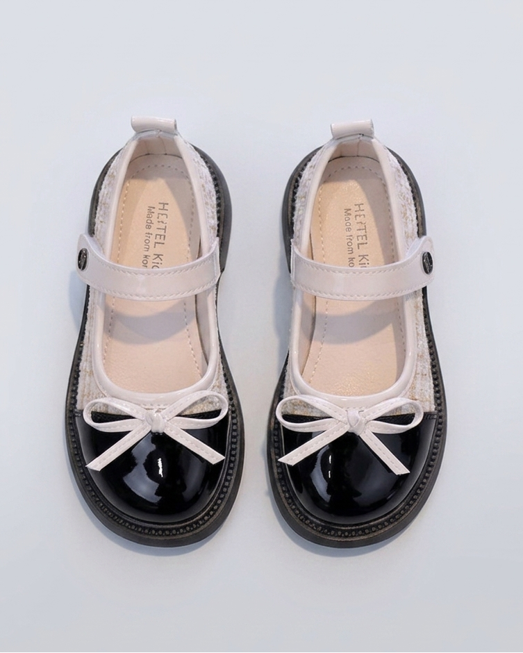 Zapato para niña con diseño brillante y lazada elegante en España