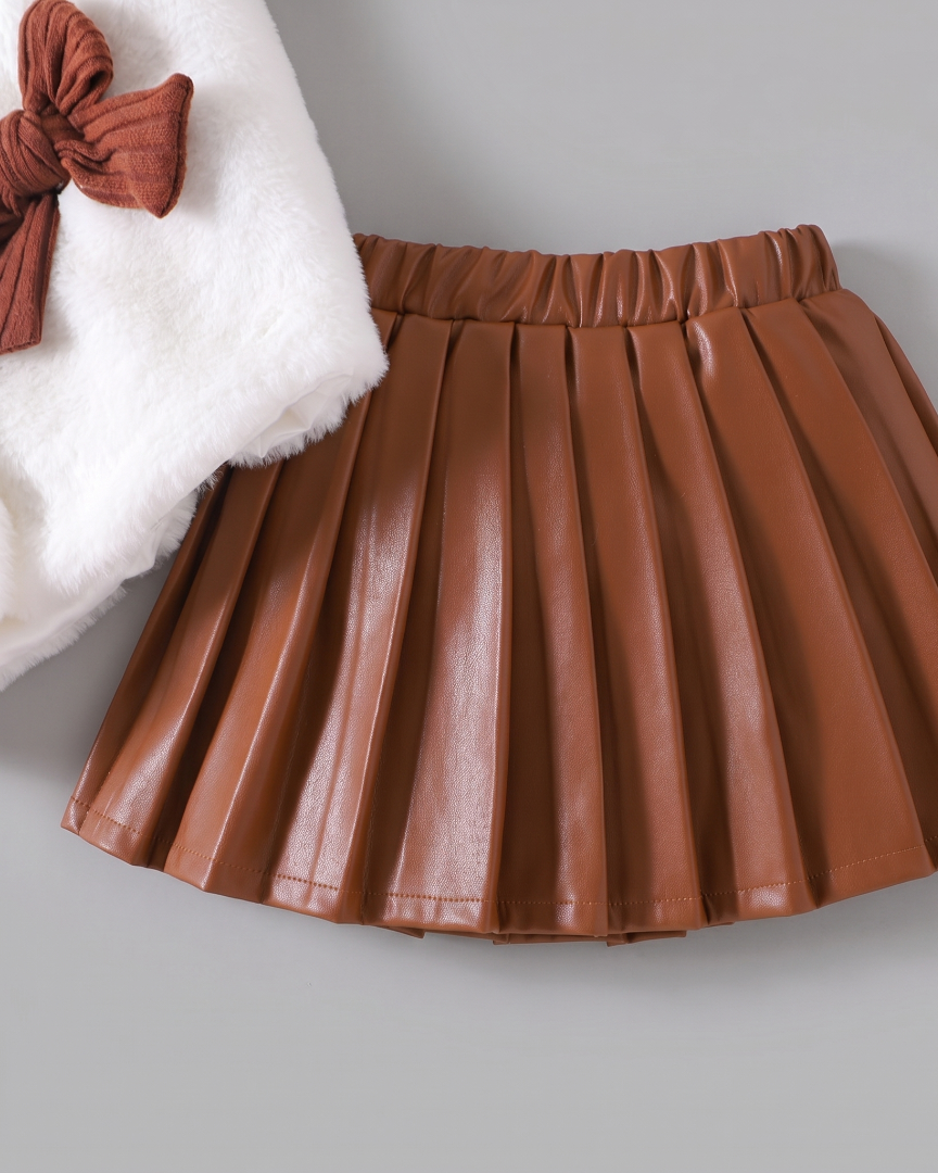 Conjunto niña invierno 3 piezas: suéter de punto, chaleco de peluche y falda de cuero sintético  en España