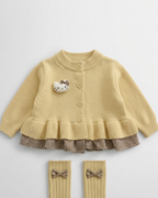 Conjunto niña invierno 2 piezas cárdigan de punto y falda estampada ,destacada para looks elegantes y sencillos en España