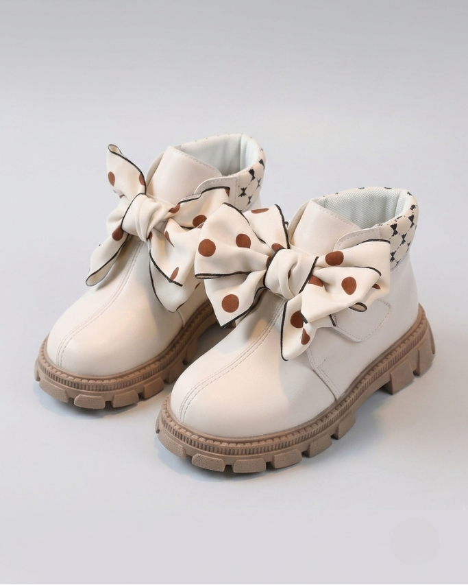 Botas de invierno elegantes con diseño de lazo de tela con lunares en España