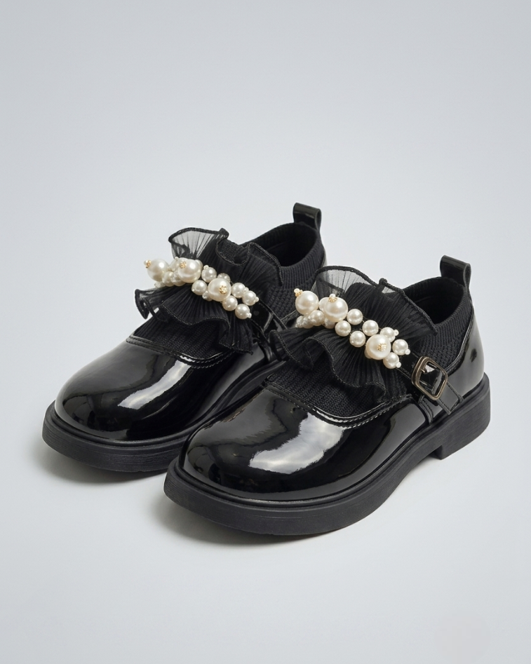 Zapato clásico brillante para niña en España