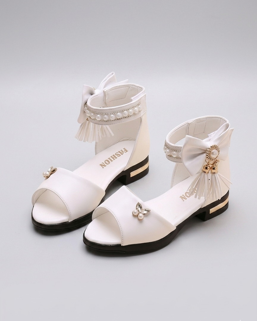 Sandalias decoradas con lazo y cuentas de perla para niñas en España