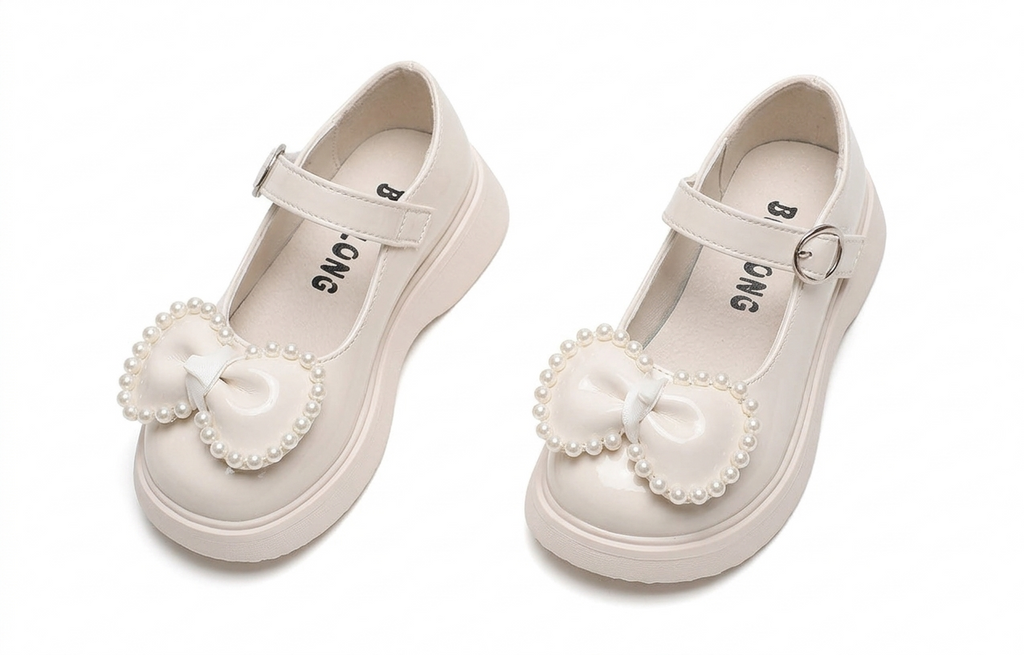 Zapato para niña con diseño de moño adornado con perlas en España