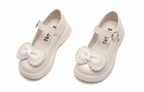 Zapato para niña con diseño de moño adornado con perlas en España