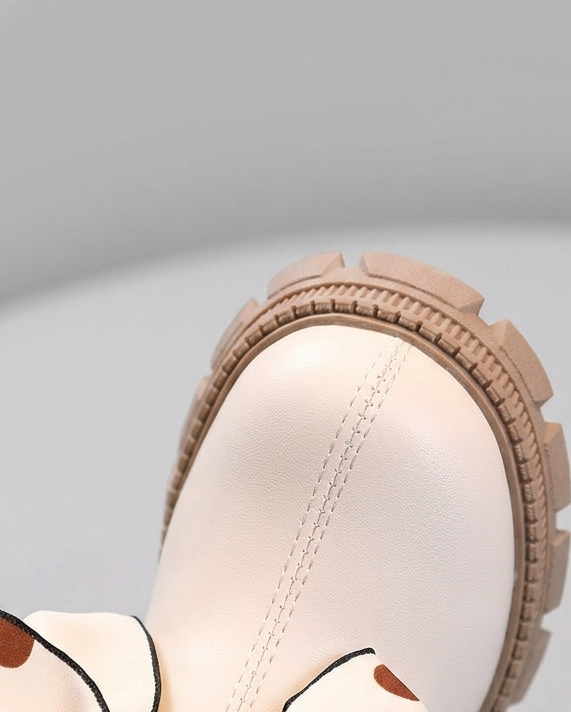 Botas de invierno elegantes con diseño de lazo de tela con lunares en España