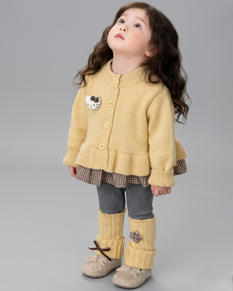 Conjunto niña invierno 2 piezas cárdigan de punto y falda estampada ,destacada para looks elegantes y sencillos en España