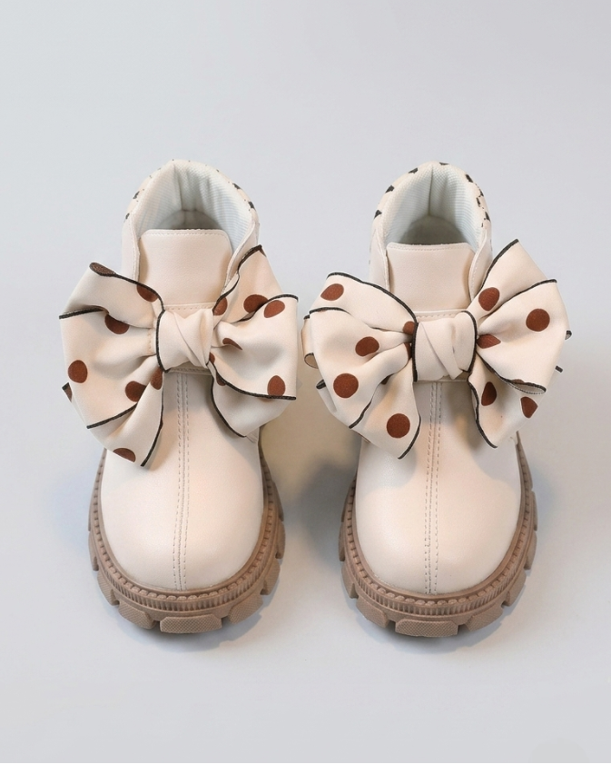 Botas de invierno elegantes con diseño de lazo de tela con lunares en España