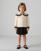 Conjunto niña invierno 2 piezas cárdigan de punto y falda estampada ,destacada para looks elegantes y sencillos en España