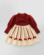 Vestido niña invierno cálido con lazos de satén y cuello altol as tallas disponibles.Ideal para primavera  en España