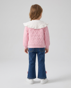 Conjunto niña 3 piezas rosa: suéter, camiseta arcoíris y pantalón vaquero con flores crochet en España