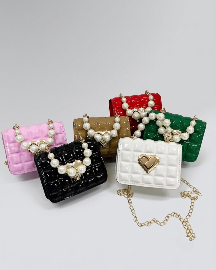 Bolso niña perlas con cadena dorada y cierre corazón