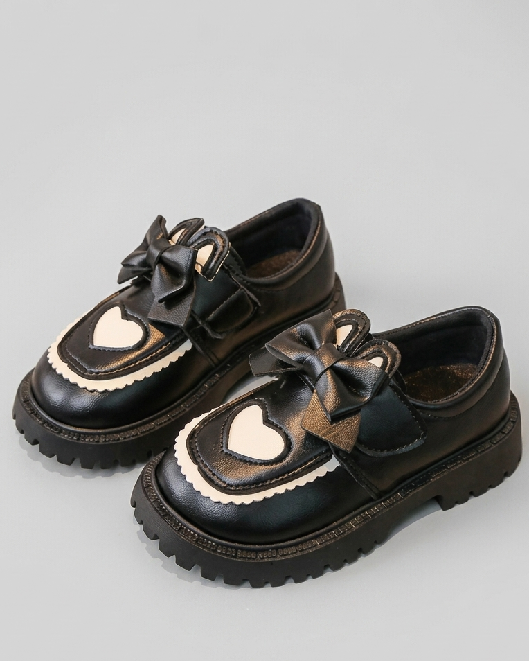 Zapato clásico elegante para niña con diseño de lazo frontal en España