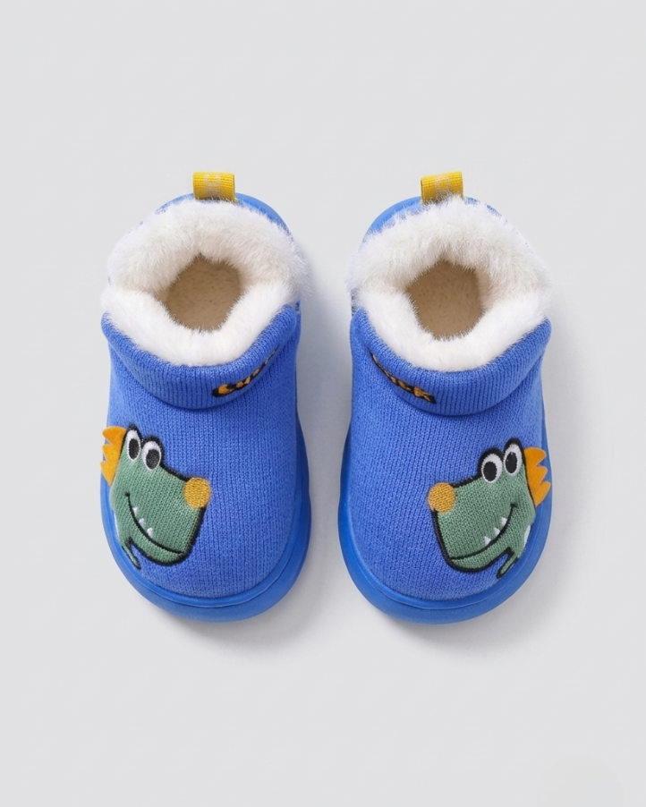 Bota de invierno acolchada con diseño de dinosaurio en España