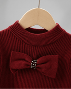 Vestido niña invierno cálido con lazos de satén y cuello altol as tallas disponibles.Ideal para primavera  en España