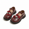Zapato elegante para niñas con lazo adornado y colores brillantes vista completa