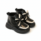 Zapato de invierno elegante con un lazo lujoso en España
