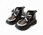 Zapato de invierno elegante con un lazo lujoso en España