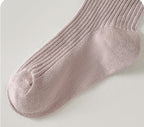 Soft pink ribbed ankle socks for kids, comfortable cotton blend, ideal for everyday wear