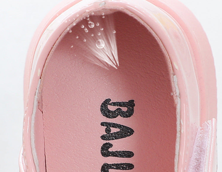 Zapato para niña con diseño de moño adornado con perlas en España